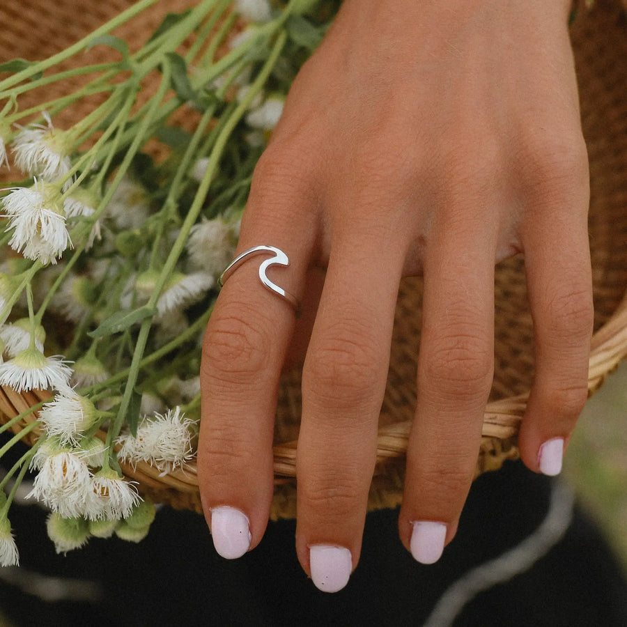 woman wearing sterling silver wave ring - women’s jewelry by australian jewellery brand indie and Harper