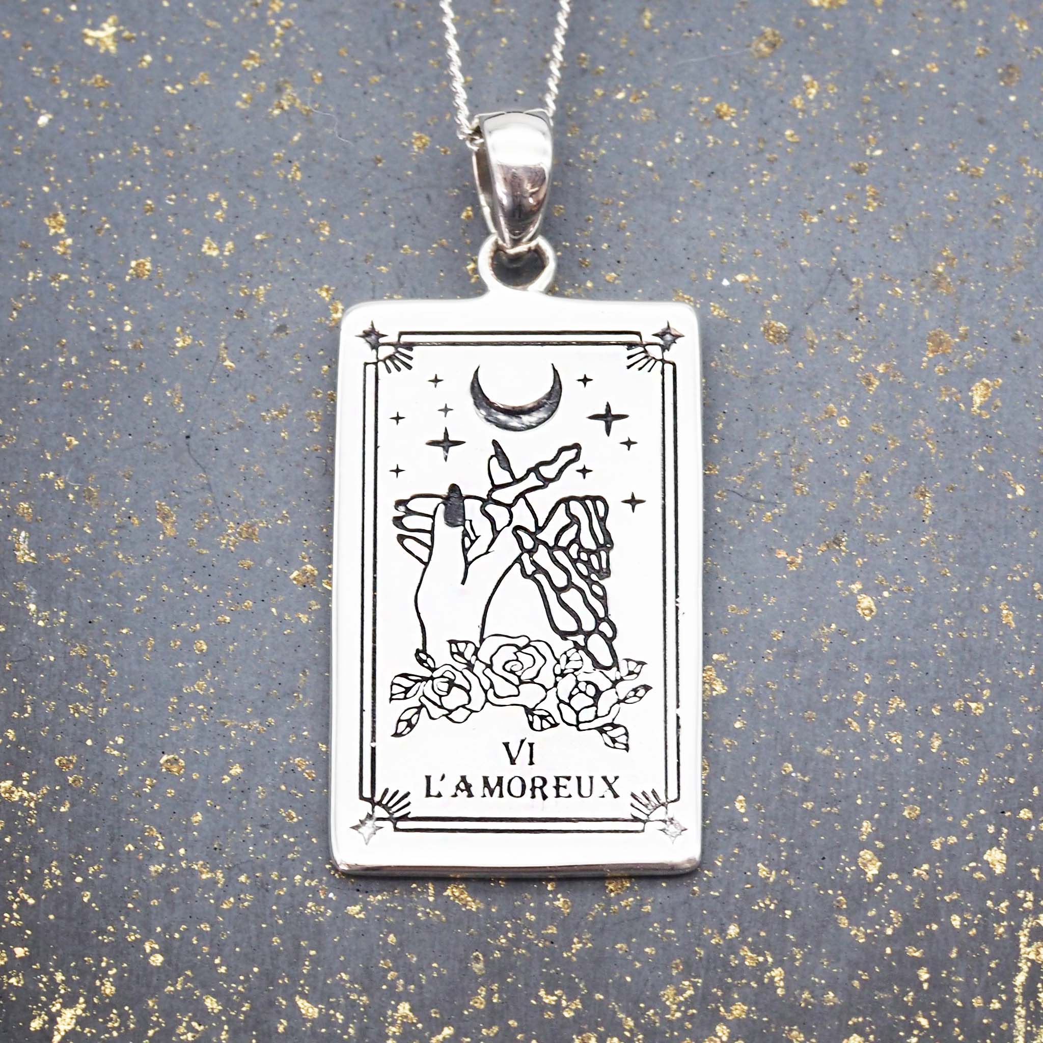 the lovers tarot necklace made with sterling silver - hand drawn the lovers tarot card design by online jewelry brand indie and harper