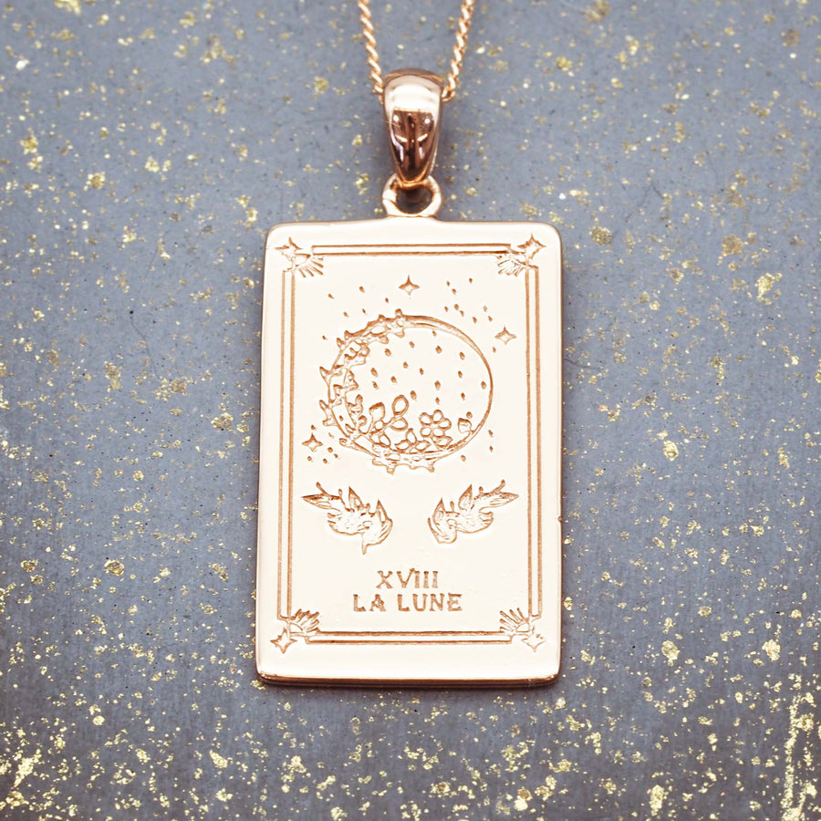 the moon tarot necklace - 9k rose gold plating over sterling silver with a hand drawn tarot card design by online jewellery brand indie and harper