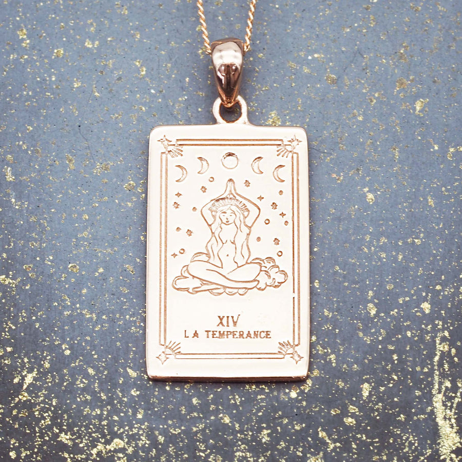 sterling silver necklace with 9k gold plating and the temperance tarot design - hand drawn and designed in australia by online jewellery brand indie and harper