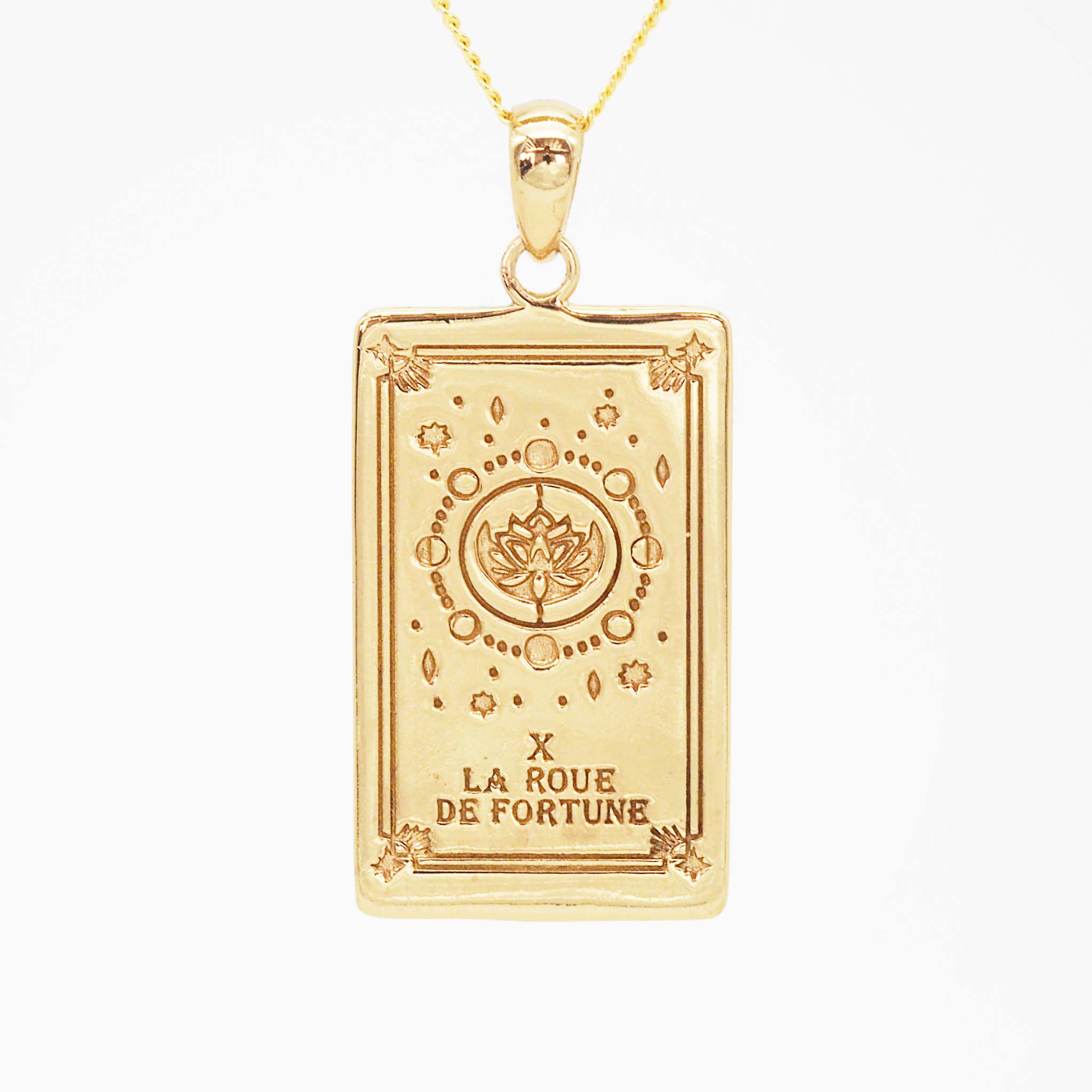 the wheel of fortune tarot card necklace in gold - tarot jewellery by boho jewelry brands indie and harper