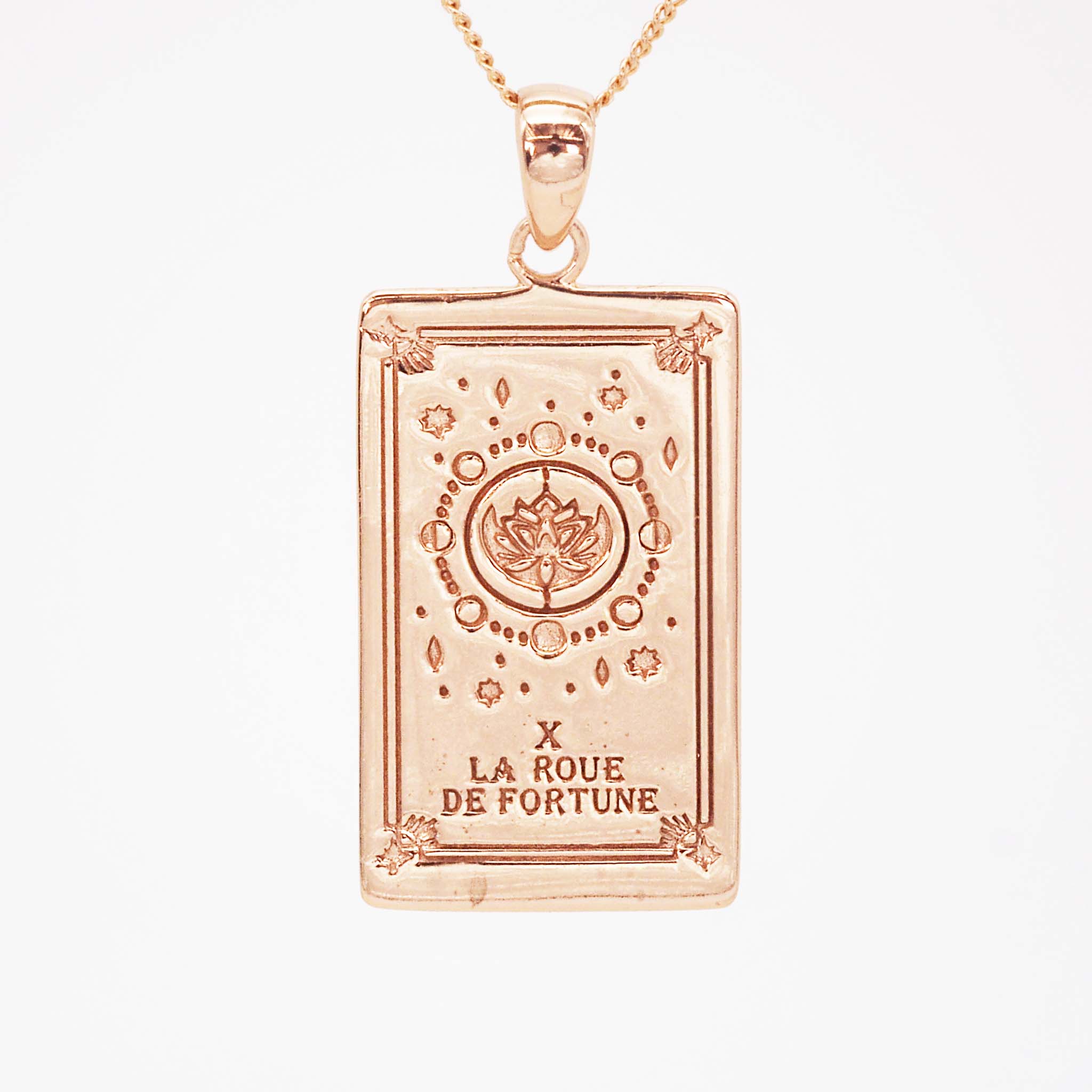 the wheel of fortune tarot card necklace in rose gold - tarot jewellery by boho jewelry brands indie and harper