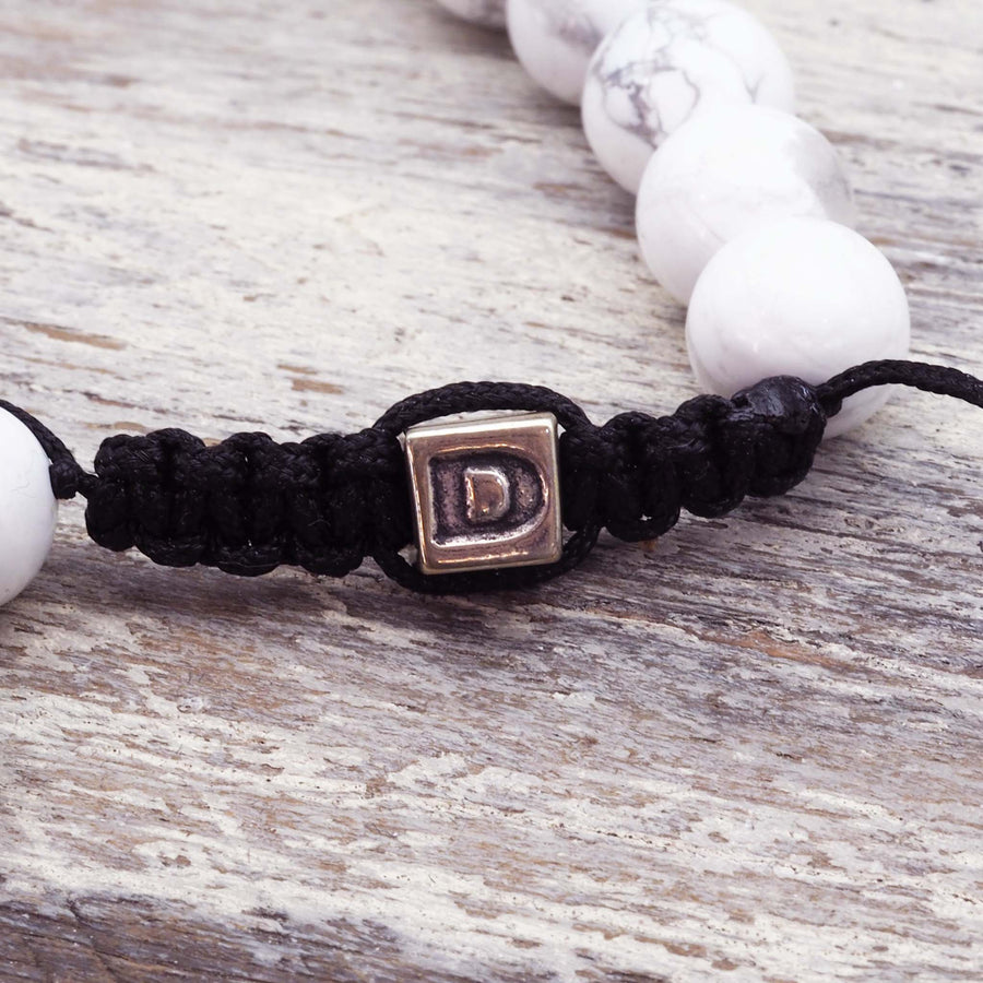 white howlite initial bracelet - women's bracelet made with black cord and natural white howlite beads - women's bracelet by online jewellery brand indie and harper