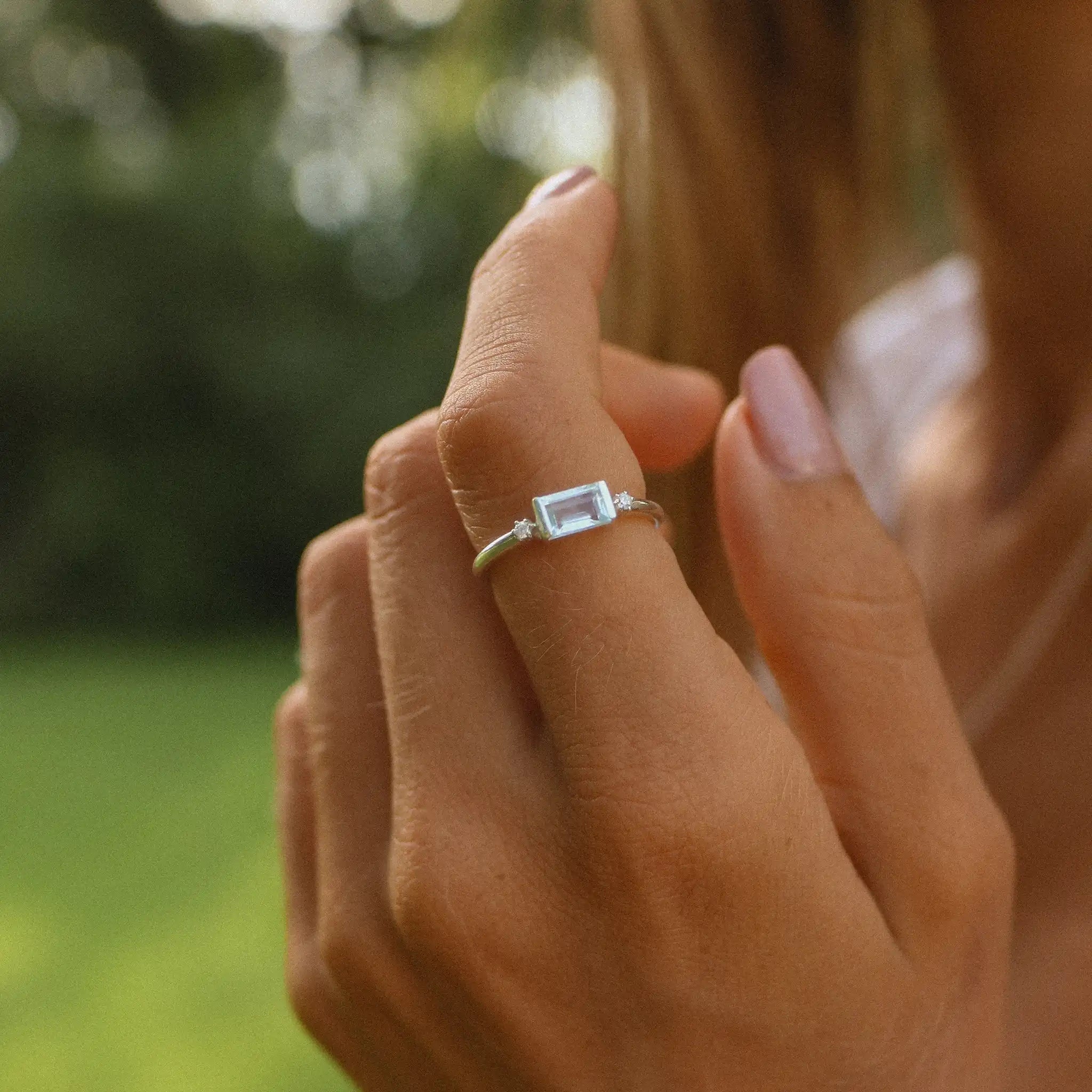 woman wearing sterling silver white topaz and aquamarine ring - womens aquamarine jewellery by Australian jewellery brands indie and Harper 