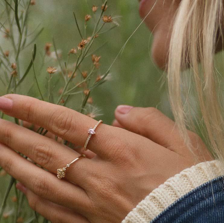 Dainty gold rings being worn - promise rings and gold jewellery by australian jewellery brands online indie and Harper