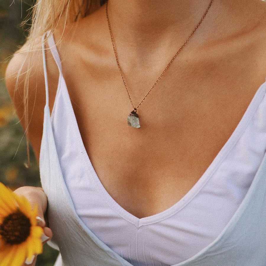 woman wearing Copper and Raw Aquamarine Necklaces - womens aquamarine jewellery by boho jewellery brand indie and harper