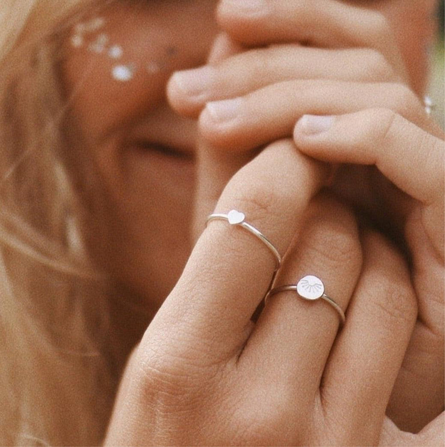 dainty sterling silver rings being worn - promise rings and womens jewellery by australian jewellery brands online indie and Harper