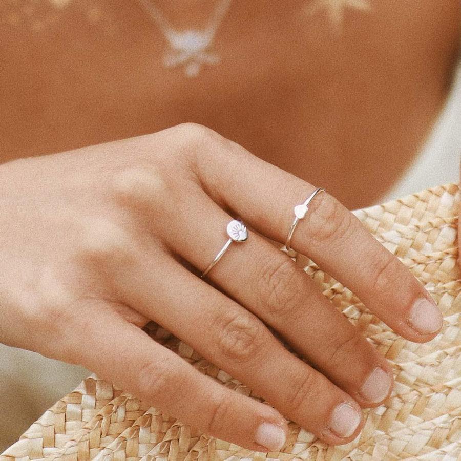 dainty sterling silver rings being worn - promise rings and womens jewellery by australian jewellery brands online indie and Harper