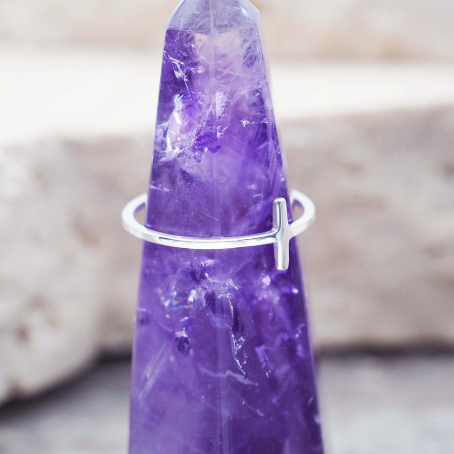 Dainty T-Bar Sterling silver Ring sitting on amethyst crystal by Australian jewellery brands online indie and harper