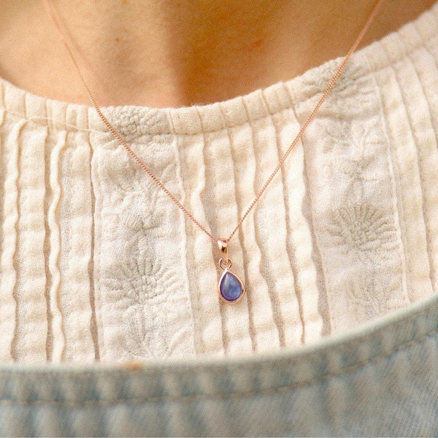 December Birthstone Necklace being worn - rose gold Tanzanite necklace - December birthstone jewellery by women’s jewelry online brand indie and Harper