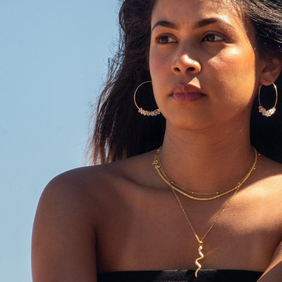 Woman wearing gold necklaces - women’s gold jewellery by Australian Jewellery brand indie and harper