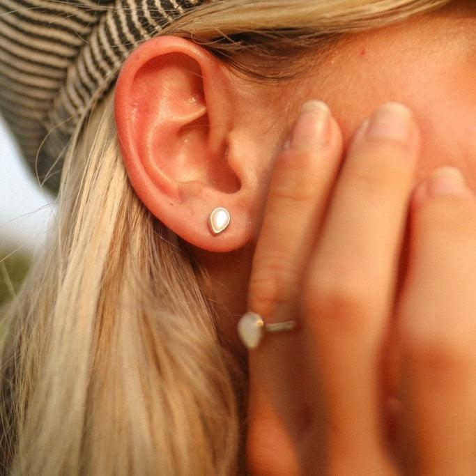 woman with blonde hair wearing June Birthstone Pearl Earrings - womens jewellery by australian jewellery brand indie and harper