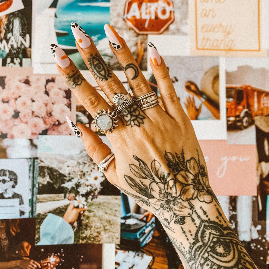 Woman with hand tattoos white wearing Moonstone Rings - boho jewellery by australian jewellery brands online indie and harper