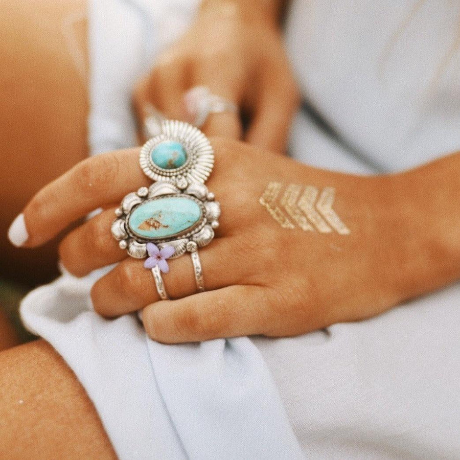 Woman wearing sterling silver statement navajo turquoise rings - Native American Jewelry and turquoise jewellery by womens jewelry brand indie and harper