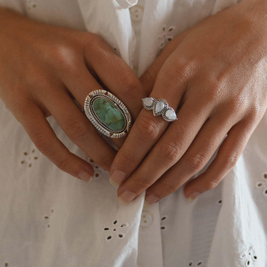 Woman wearing Sterling silver turquoise ring and Moonstone Ring - womens boho jewelry by Australian jewellery brands online indie and harper