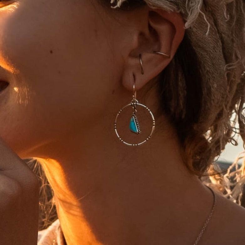 woman wearing Tribal Turquoise Earrings - turquoise jewelry by boho jewelry store indie and harper