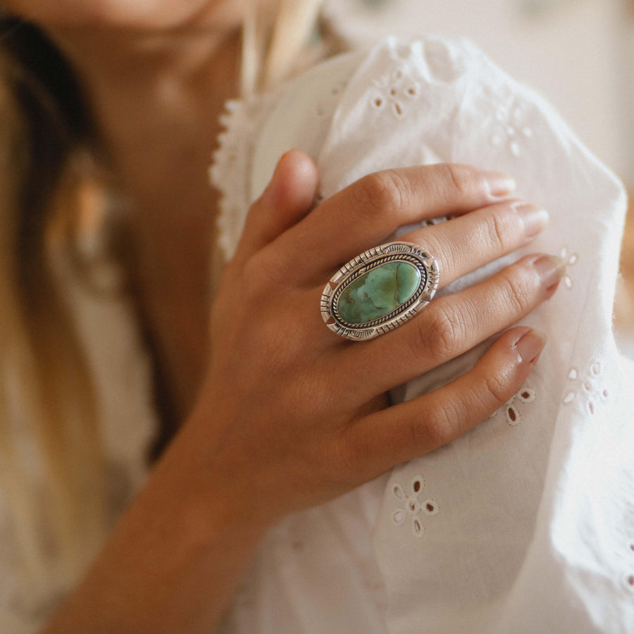 woman in white top wearing sterling silver Turquoise Ring - womens turquoise jewellery by Australian jewellery brands indie and harper