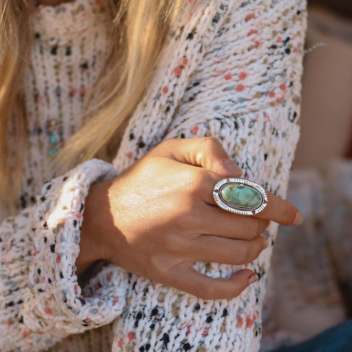 woman in knit jumper wearing Turquoise Ring - womens turquoise jewellery by Australian jewellery brands indie and harper