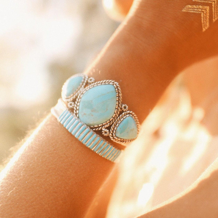 Turquoise warrior Cuff being worn - turquoise jewellery by women’s jewellery online brand indie and harper