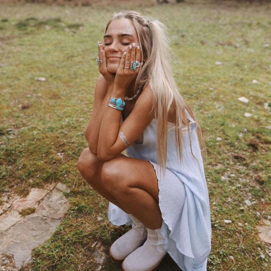 Girl wearing turquoise jewellery - boho jewellery by women’s jewelry online brand indie and harper