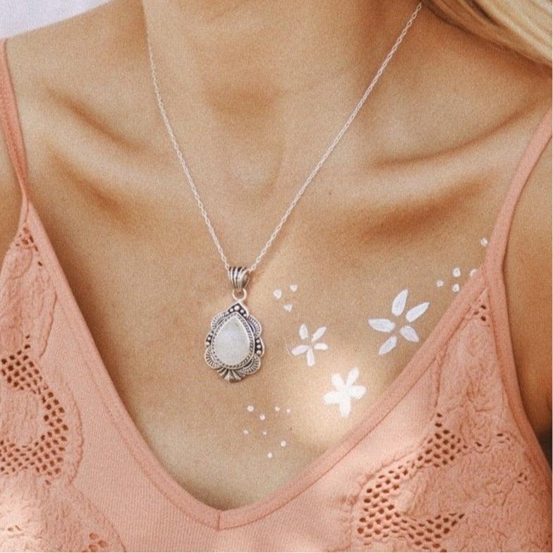 woman wearing sterling silver wild flower moonstone necklace - moonstone jewellery by australian jewellery brands online store indie and harper 